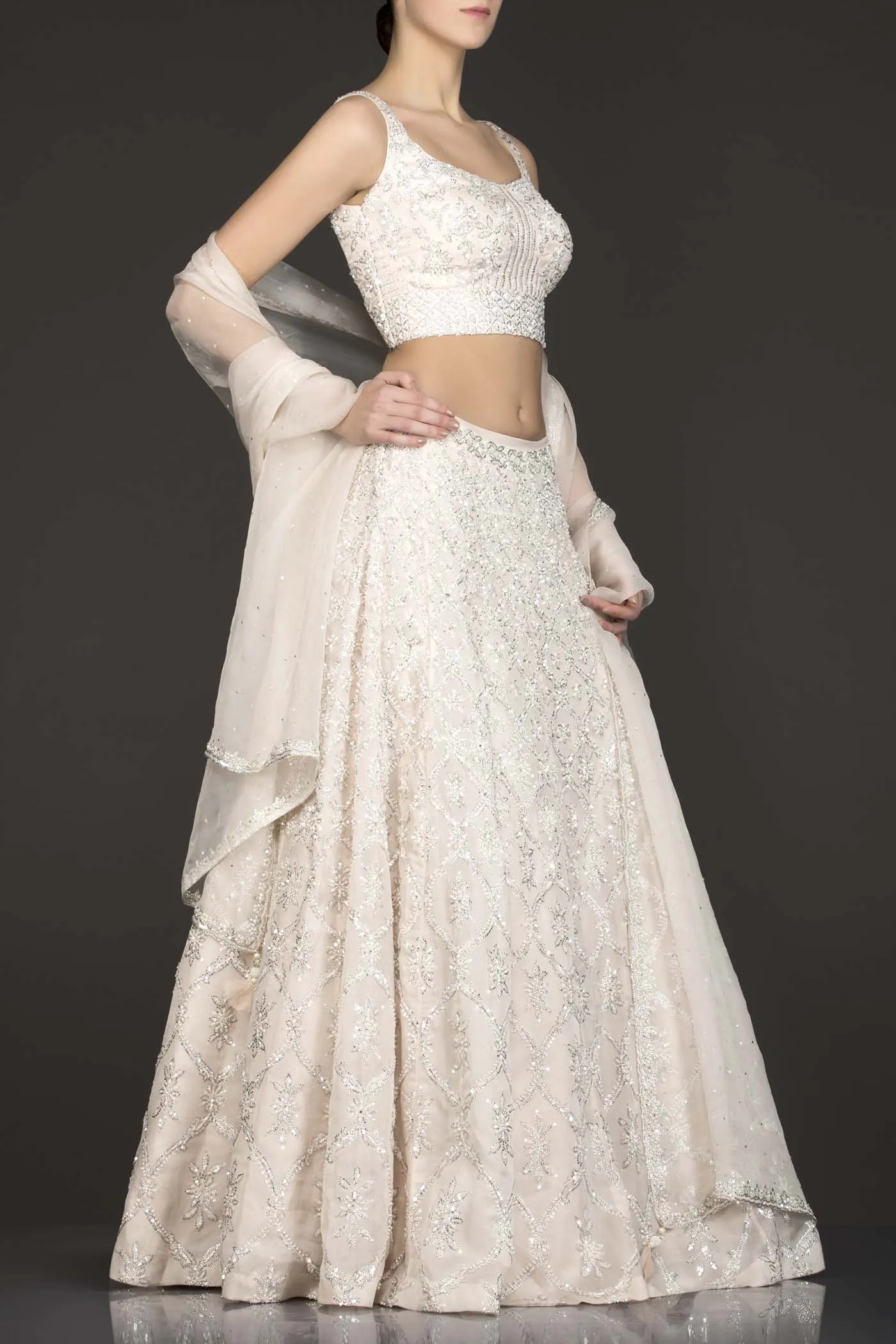 Ivory Colour Organza Lehenga Top With Silver Work And Net Dupatta